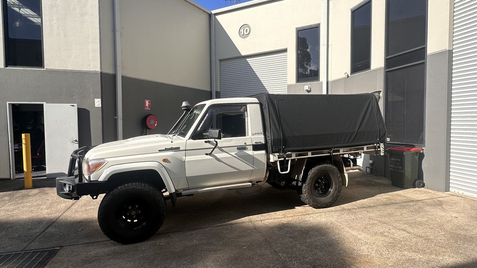 Canvas canopy fitted over a ute tray